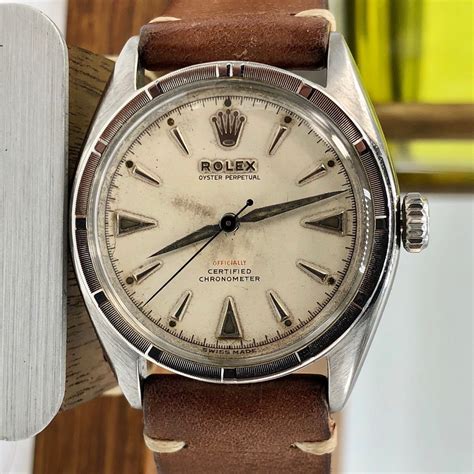 Rolex red writing on dial